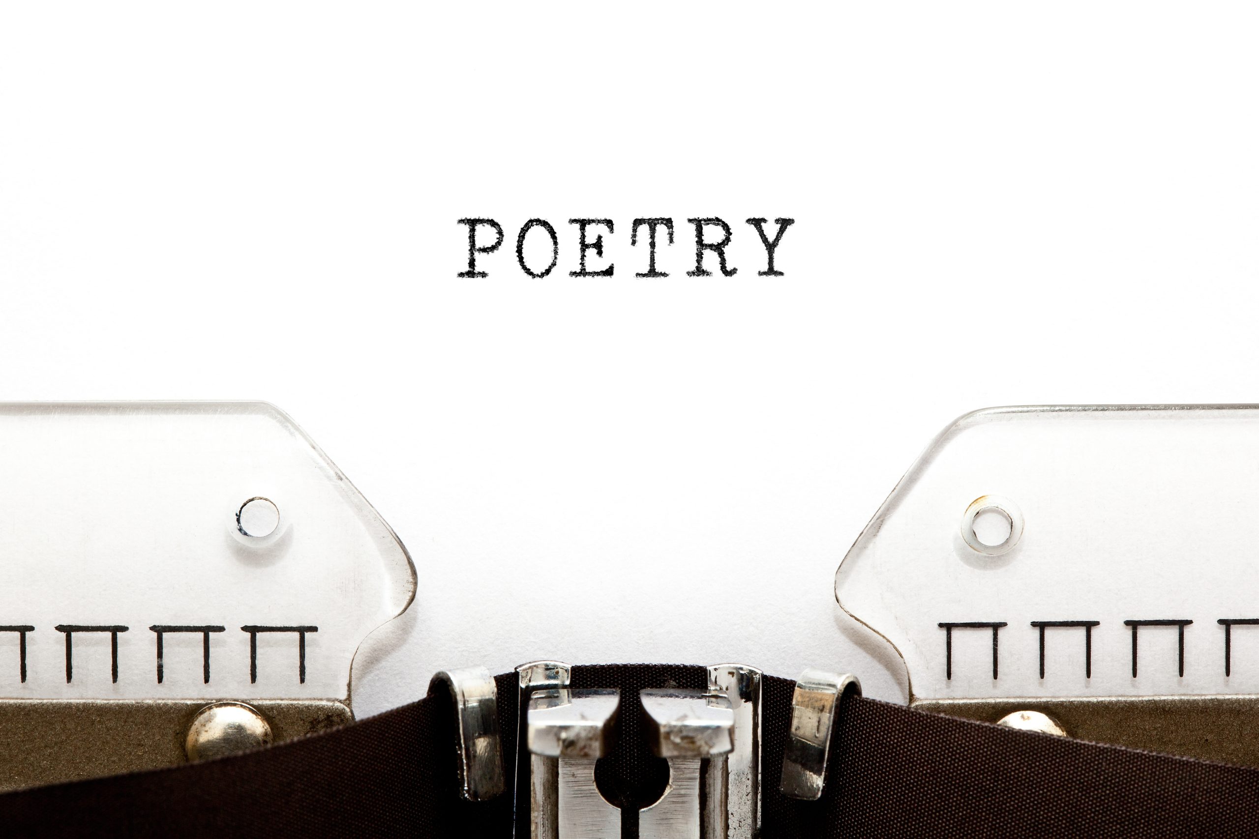 <p>The word Poetry typed on vintage typewriter with copy space.</p>