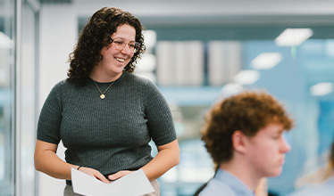 A teacher smiling