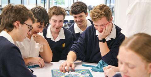 A group of senior students playing a game